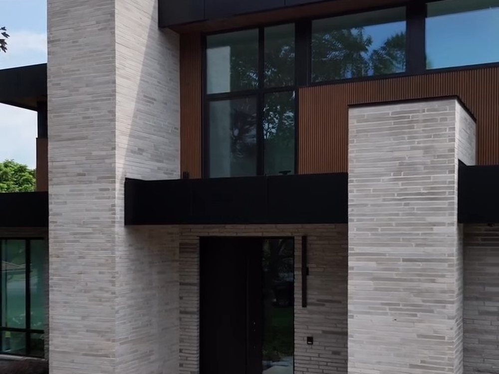 Modern Enclave in Ancaster, elongated Northern natural stone at the entrance